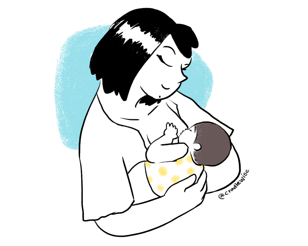 Breastfeeding mom holding the baby