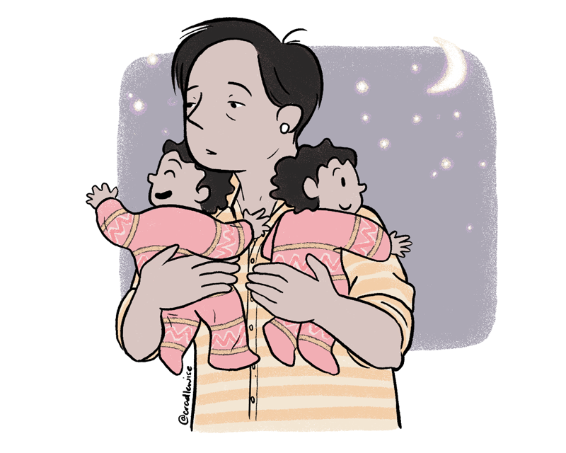 A sleepy father carrying his twins